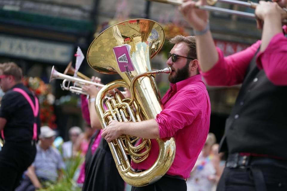 Tuba with pink outfit