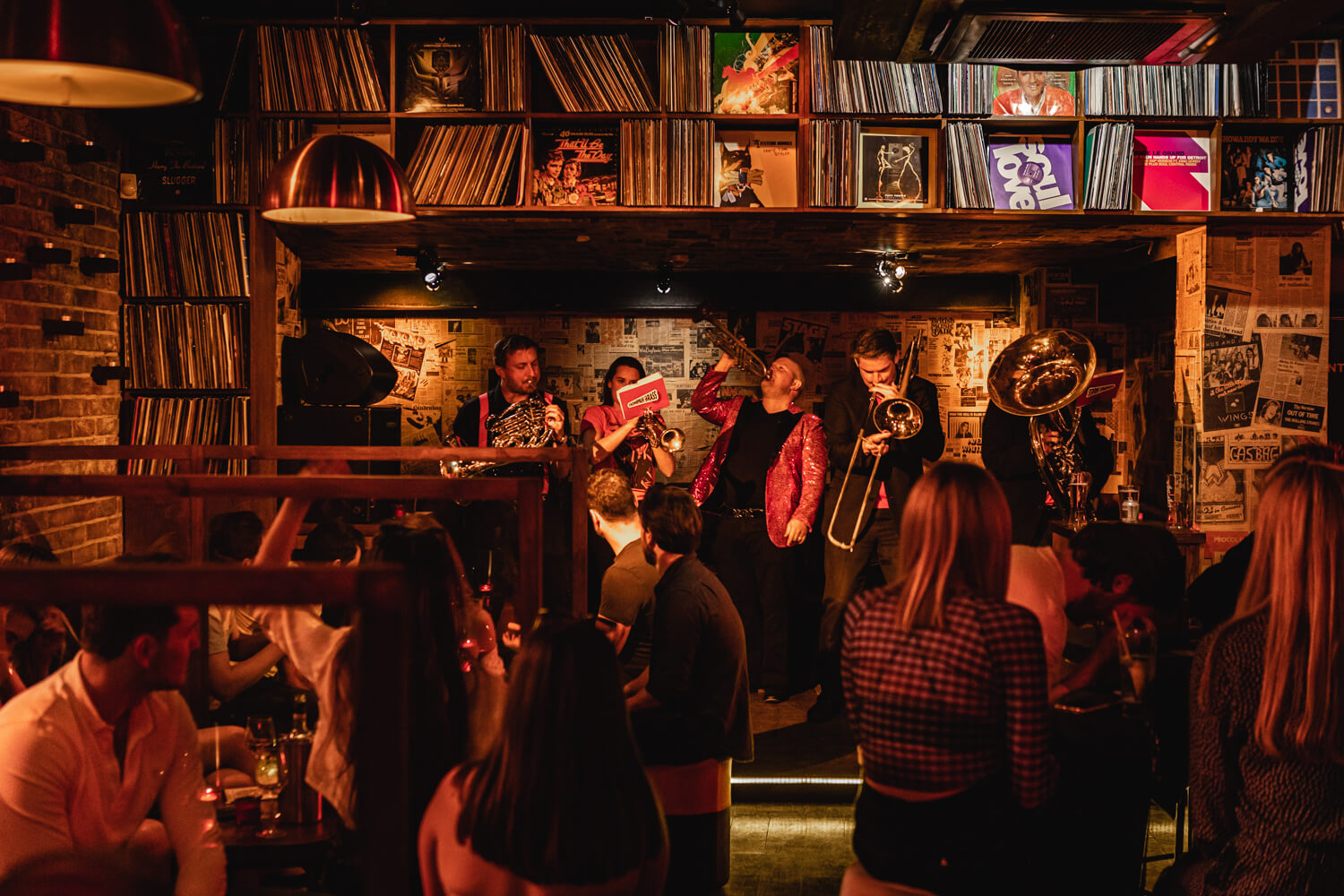 Band with records at bar